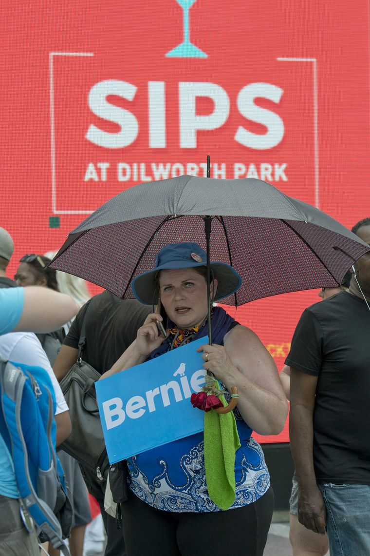 bernie supporter w sips sign